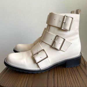 White leather boots with buckles